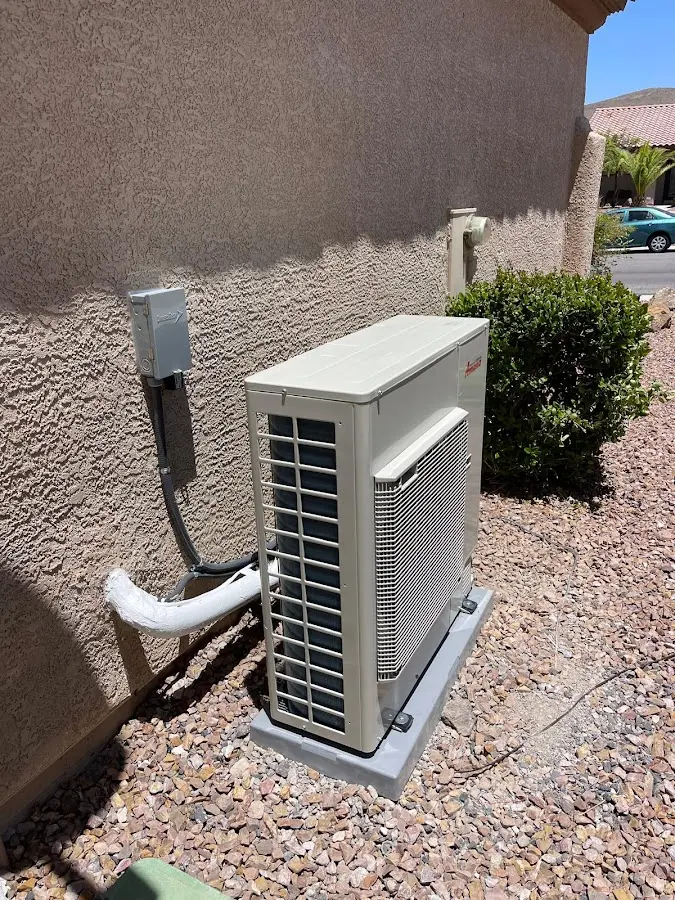 Residential air conditioning condenser unit in Taft